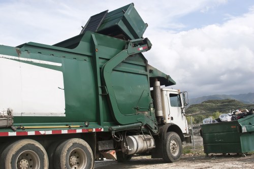 Variety of construction waste including concrete, wood, and metals.